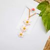 3 layered daisy pendant by mindful vibing