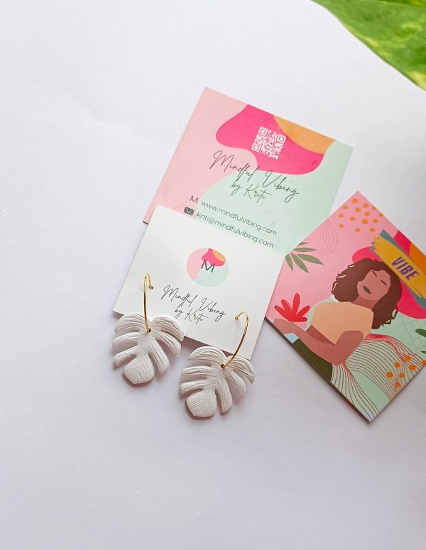 White Monstera Earrings by mindful vibing